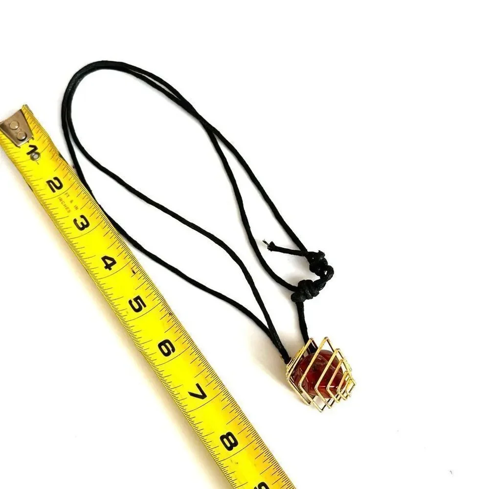 Red jasper gold tone caged pendant necklace